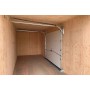 Garage préfabriqué en containers maritimes 28 m² avec porte sectionnelle extra large